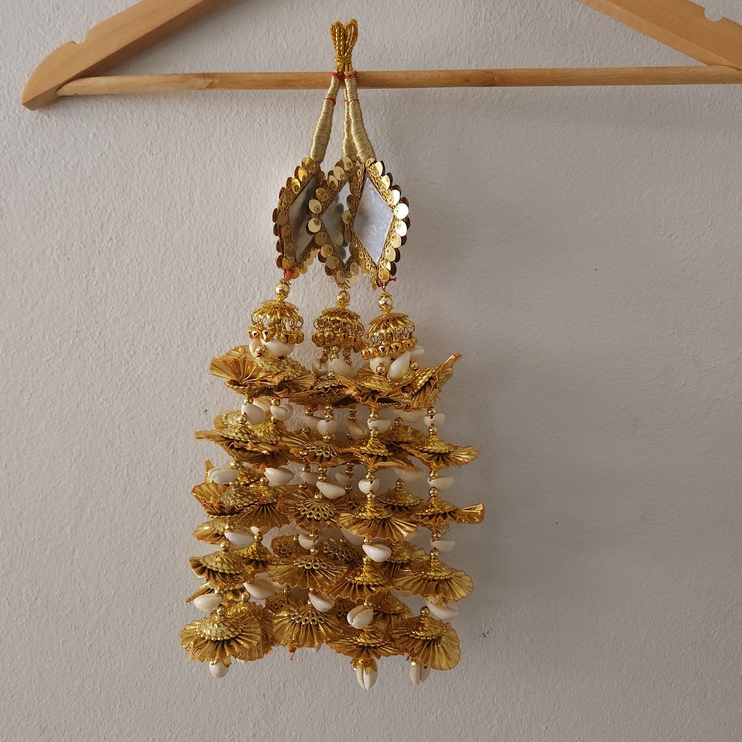 golden-color-kaudi-design-big-mirrors-diamond-shape