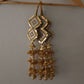 golden-color-two-diamonds-shaped-kaudi-design